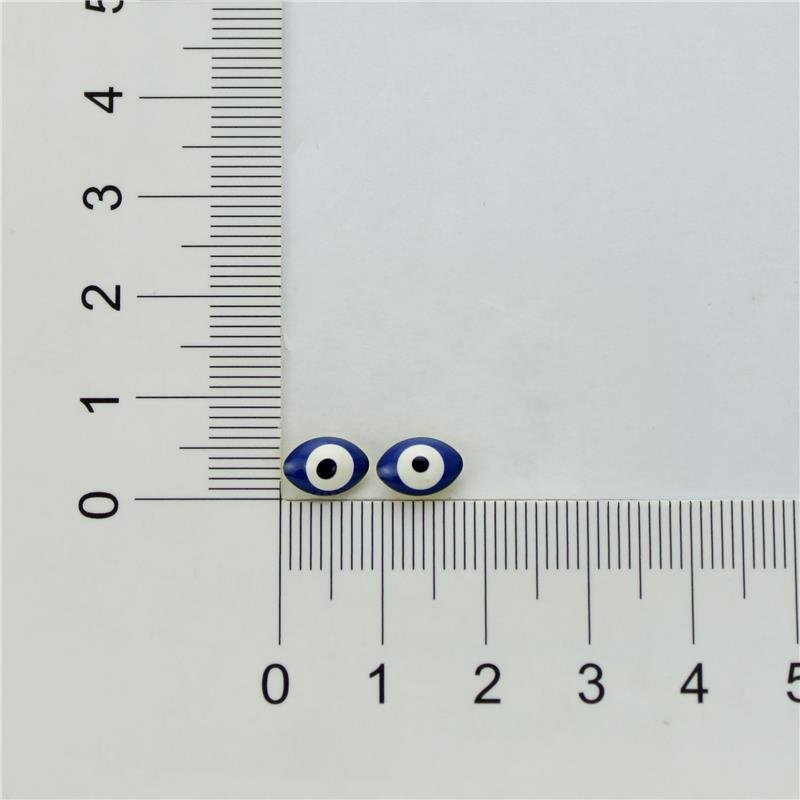 BRINCO FORTUNATO OLHO GREGO AZUL ESCURO NO BRUTO