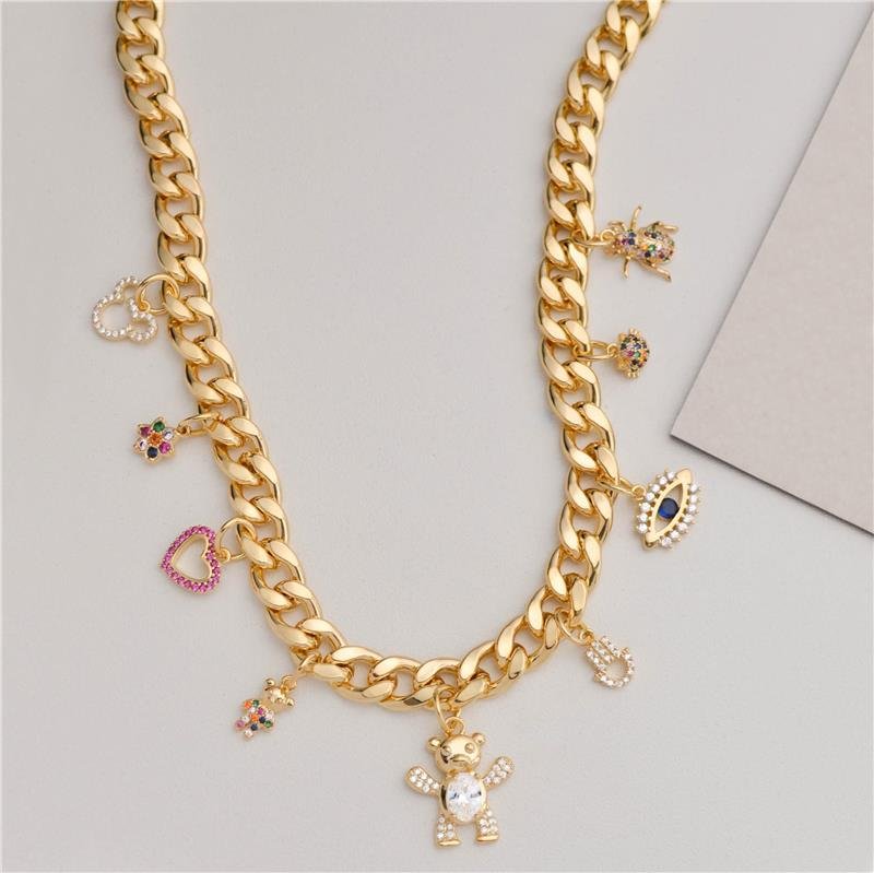 PINGENTE FORTUNATO URSO 16MM CRAVEJADO CRISTAL NO BRUTO